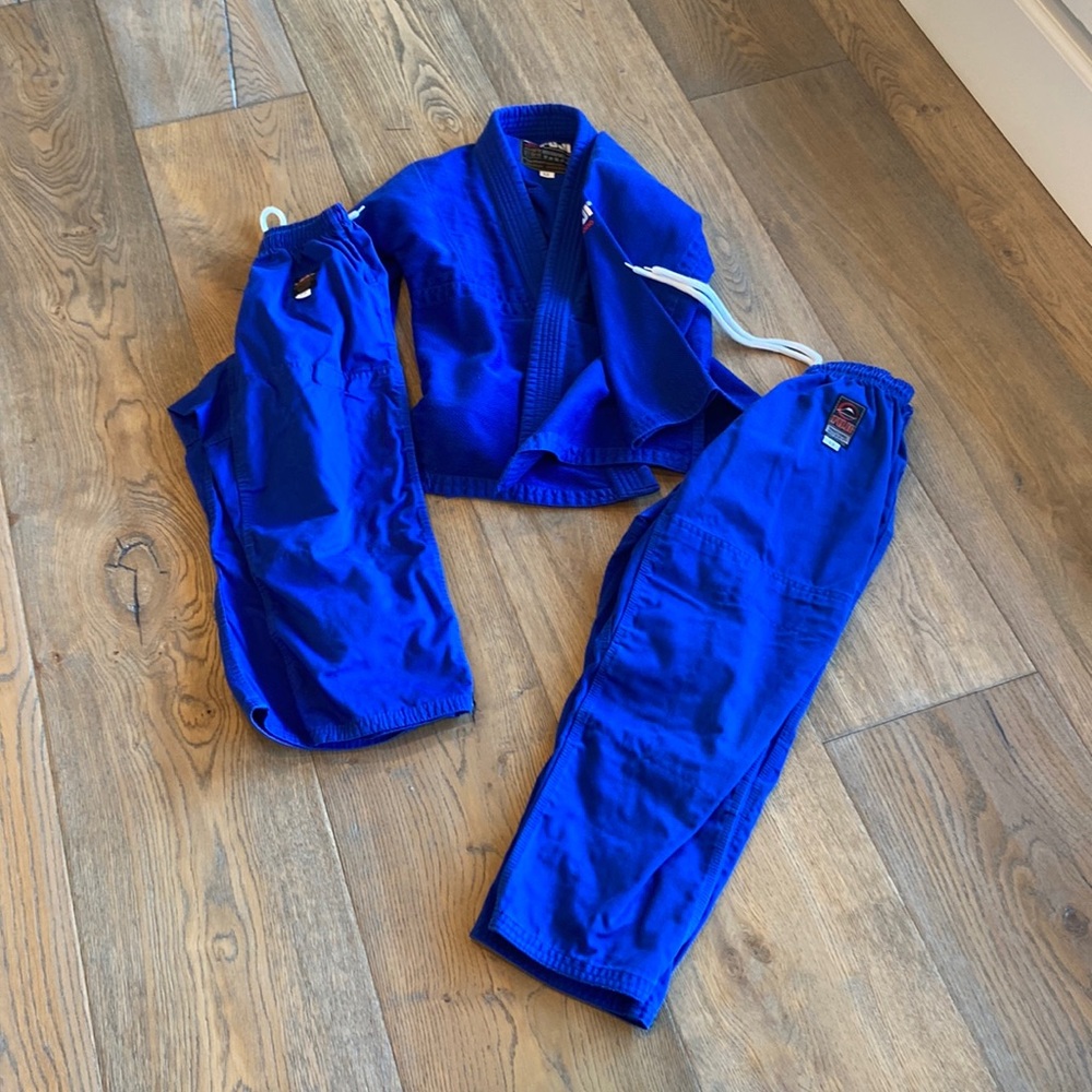 Excellent condition Boys Ju Jitsu Gi. Size C2 with 2 pair of pant size C2 and C3